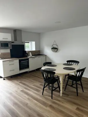 Cuisine ou kitchenette dans l'établissement Petite maison