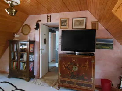 Télévision ou salle de divertissement dans l'établissement Ty An Eol