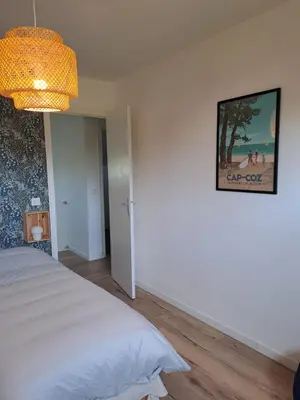 Un ou plusieurs lits dans un hébergement de l'établissement Belle maison proche centre ville et plage (3,5km)