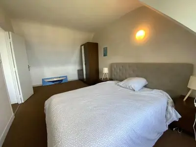 Un ou plusieurs lits dans un hébergement de l'établissement Maison plage de Pors Péron
