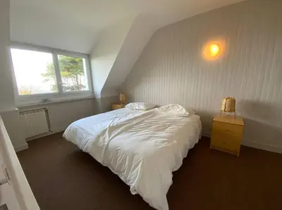 Un ou plusieurs lits dans un hébergement de l'établissement Maison plage de Pors Péron