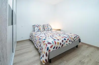 Un ou plusieurs lits dans un hébergement de l'établissement Villa Plain-Pied Vue Mer