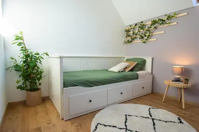 Un ou plusieurs lits dans un hébergement de l'établissement Maen Glas I Jacuzzi & Grand domaine