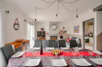 Coin salon dans l'établissement Maison 5 chambres avec accès direct à la plage