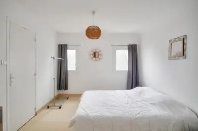 Un ou plusieurs lits dans un hébergement de l'établissement Maison 5 chambres avec accès direct à la plage