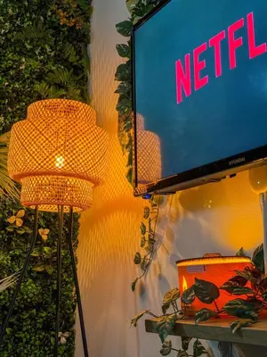 Télévision ou salle de divertissement dans l'établissement Ô Bien-Être