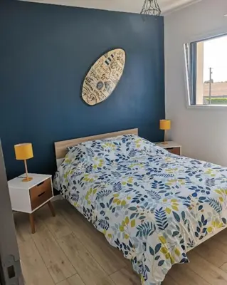 Un ou plusieurs lits dans un hébergement de l'établissement Célest' Inn