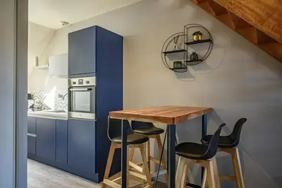 Cuisine ou kitchenette dans l'établissement Le Duplex, proche centre-ville