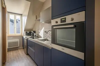 Cuisine ou kitchenette dans l'établissement Le Duplex, proche centre-ville