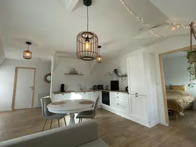 Coin salon dans l'établissement Appartement en centre ville de Gourin