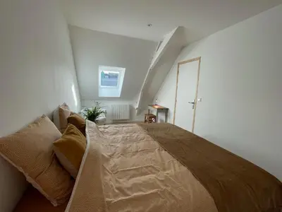 Un ou plusieurs lits dans un hébergement de l'établissement Appartement en centre ville de Gourin