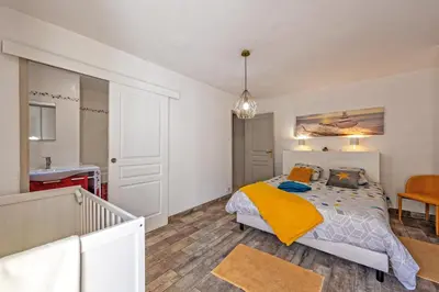 Un ou plusieurs lits dans un hébergement de l'établissement Ty Kap - Maison 4 chambres vue mer