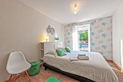 Un ou plusieurs lits dans un hébergement de l'établissement Ty Kap - Maison 4 chambres vue mer