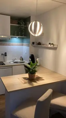 Cuisine ou kitchenette dans l'établissement Cozy’Wood
