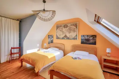 Un ou plusieurs lits dans un hébergement de l'établissement Pays Bigouden, maison pour 8 avec piscine