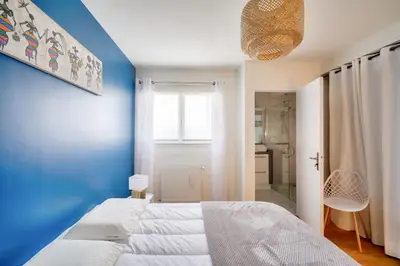 Un ou plusieurs lits dans un hébergement de l'établissement Pays Bigouden, maison pour 8 avec piscine