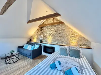 Un ou plusieurs lits dans un hébergement de l'établissement Studio cosy - renove - calme - 3 personnes - proche gare et centre historique