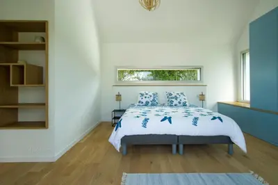 Un ou plusieurs lits dans un hébergement de l'établissement Tipoz'Immo - Ti Marin 500m de la plage et restaurant à pied - linge inclus et lits faits - wifi inclus - grande terrasse plein sud - spacieuse - lumineuse