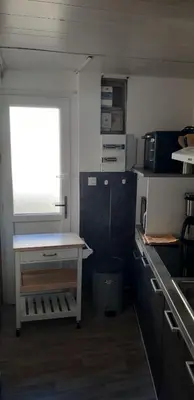 Cuisine ou kitchenette dans l'établissement Gite aux portes de la Pointe du Raz
