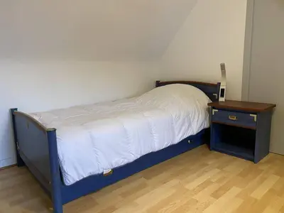 Un ou plusieurs lits dans un hébergement de l'établissement Maison à Trébeurden : Jardin, Terrasse, WIFI, Parking, 3 Chambres, Plages et Commerces à Proximité - FR-1-368-402