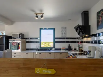Cuisine ou kitchenette dans l'établissement Holiday Home Ty Mat by Interhome