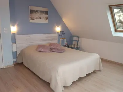 Un ou plusieurs lits dans un hébergement de l'établissement Holiday Home La maison de Toul an Dour by Interhome