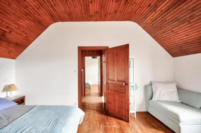 Un ou plusieurs lits dans un hébergement de l'établissement Pays bigouden - Charmante maison en pierre pour 6