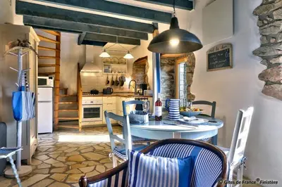 Cuisine ou kitchenette dans l'établissement Gîte chaleureux à 3km des plages