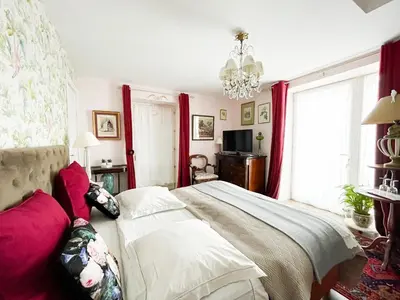 Télévision ou salle de divertissement dans l'établissement Domaine de Praterou
