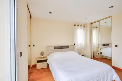 Un ou plusieurs lits dans un hébergement de l'établissement Grande maison vue mer au Guilvinec
