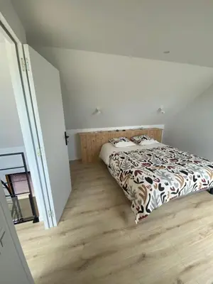 Un ou plusieurs lits dans un hébergement de l'établissement Vue Mer Très belle plage à pied Maison proche Lesconil Loctudy