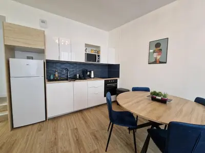 Cuisine ou kitchenette dans l'établissement Cosy & Work - 2 chambres- Centre