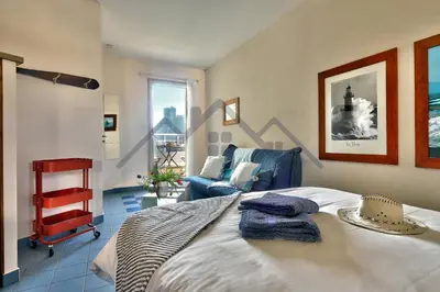 Un ou plusieurs lits dans un hébergement de l'établissement LocaLise - B80 - La villa Blanche - L'iroise - 1er étage plain pied - Wifi inclus - Draps inclus - Animaux bienvenues