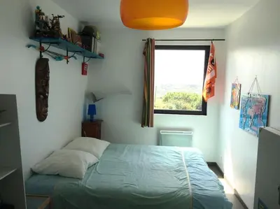 Un ou plusieurs lits dans un hébergement de l'établissement Pura Vida Camaret - Villa Vue Mer - sauna piscine intérieure