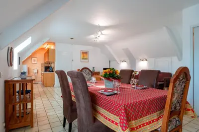 Coin salon dans l'établissement Jacinthe - Appt dans une villa néo-bretonne