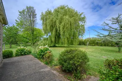 Jardin de l'établissement Jacinthe - Appt dans une villa néo-bretonne