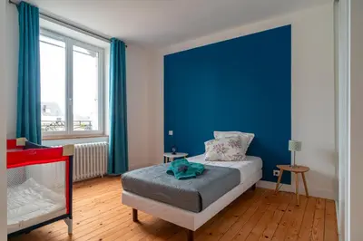 Un ou plusieurs lits dans un hébergement de l'établissement Ty Boca - Maison pour 6 avec jardin