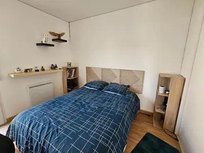 Un ou plusieurs lits dans un hébergement de l'établissement Maison individuelle de plein pied