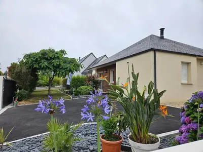 Jardin de l'établissement Maison individuelle de plein pied