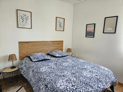 Un ou plusieurs lits dans un hébergement de l'établissement Maison individuelle de plein pied