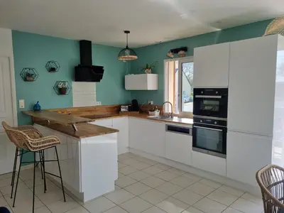 Cuisine ou kitchenette dans l'établissement Maison individuelle de plein pied