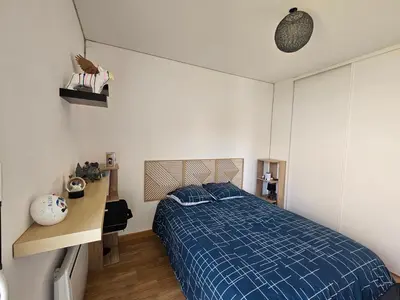 Un ou plusieurs lits dans un hébergement de l'établissement Maison individuelle de plein pied