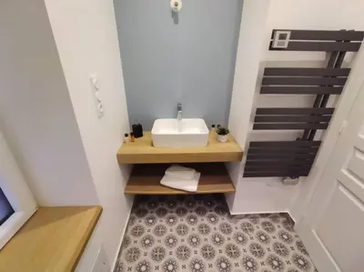 Un ou plusieurs lits dans un hébergement de l'établissement La Maison de Tante Yvonne - Gîte de Kerblaise