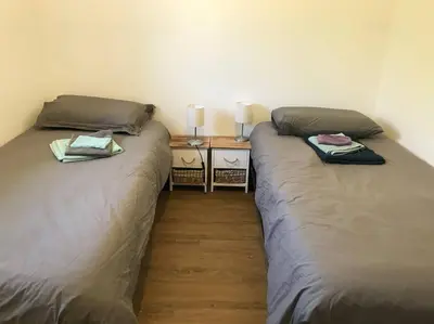 Un ou plusieurs lits dans un hébergement de l'établissement Maison sur la côte des légendes 4P