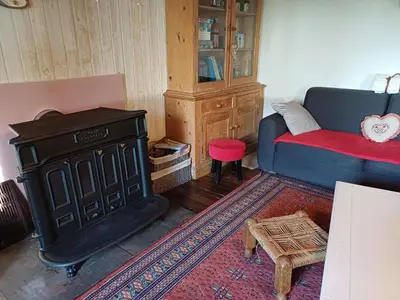 Coin salon dans l'établissement La maison au cœur de la forêt