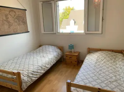 Un ou plusieurs lits dans un hébergement de l'établissement TY ARVOR Maison à 5 minutes de la plage Concarneau