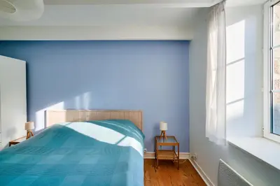 Un ou plusieurs lits dans un hébergement de l'établissement Escapade dans une belle longere a Penmarch