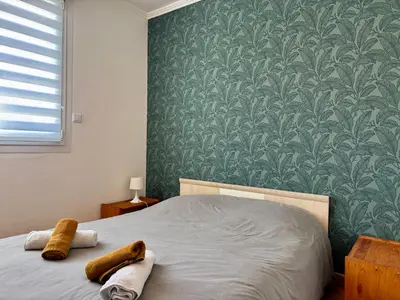 Un ou plusieurs lits dans un hébergement de l'établissement LA REUNION - Maison - Jardin Clos - Wifi