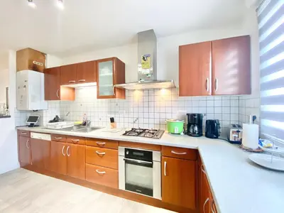 Cuisine ou kitchenette dans l'établissement LA REUNION - Maison - Jardin Clos - Wifi