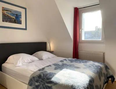 Un ou plusieurs lits dans un hébergement de l'établissement Maison VUE MER, jardin, terrasse, WIFI, au SUD, à TREBEURDEN - Réf 663